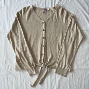 Francesca’s cream cardigan sweater in size small.